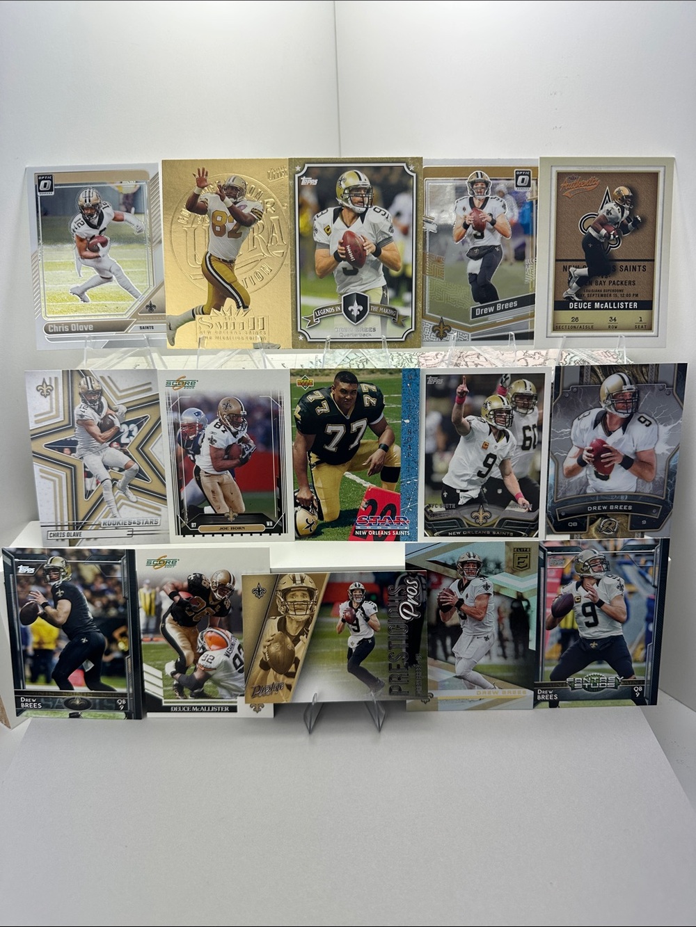 Drew Brees Saints lot of 15 w/ McAllister/Horn/Olave/Irv Smith Gold Medallion